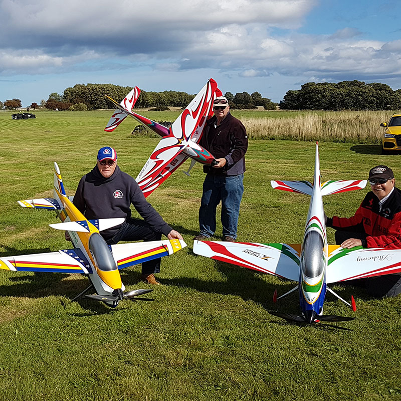 Photo of F3A competitors and planes