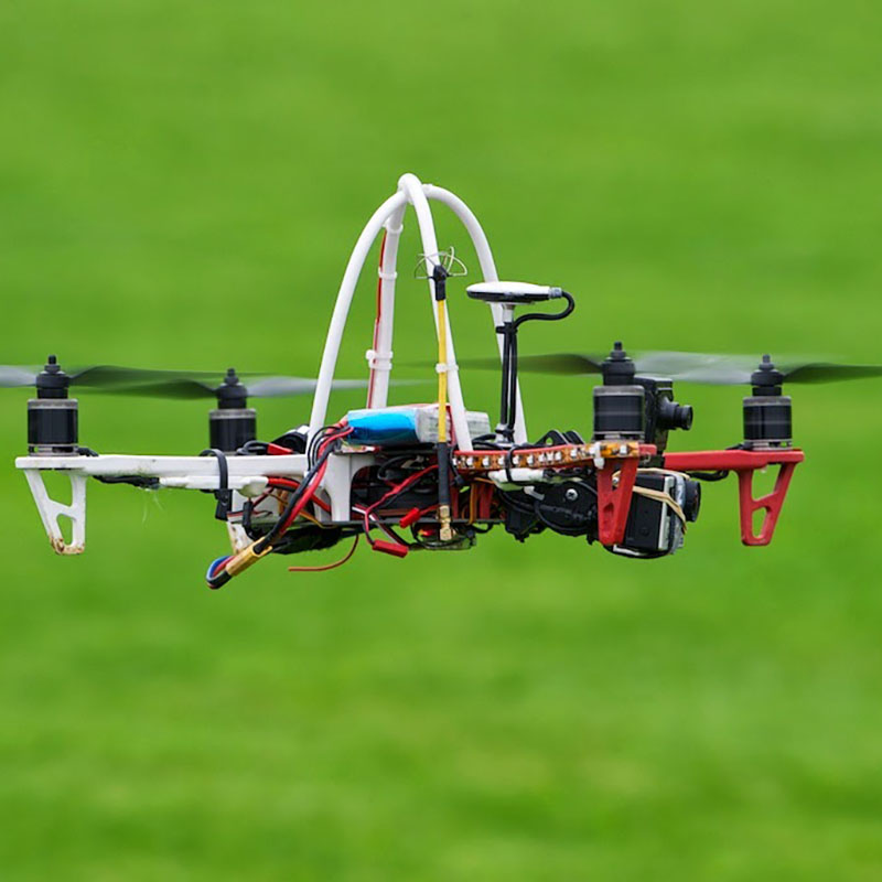 Photo of multi-rotor drone in flight